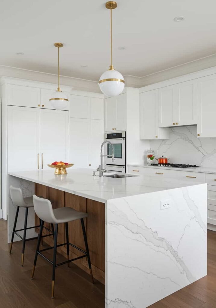 All-White Minimalist Luxury Kitchen with Hidden Appliances
