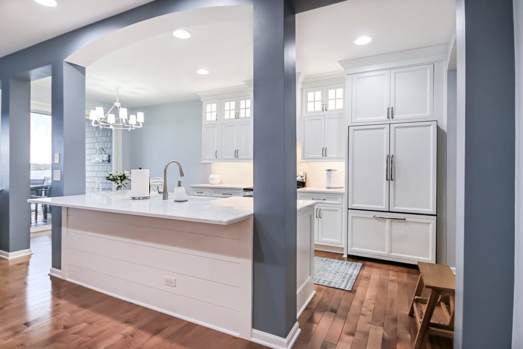 Elegant Coastal-Inspired Kitchen with Soft Blue Accents
