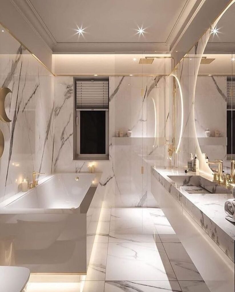 Luxurious Marble Bathroom with Gold Accents
