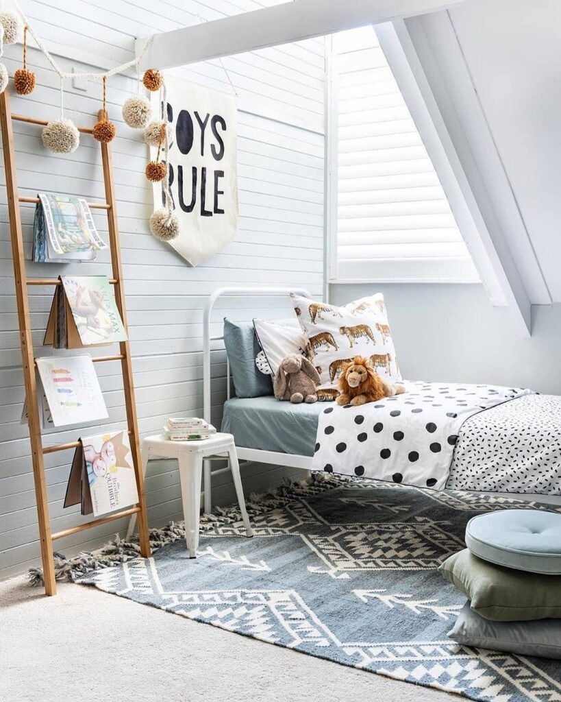 Minimalist Boys' Room with a Cozy and Playful Touch
