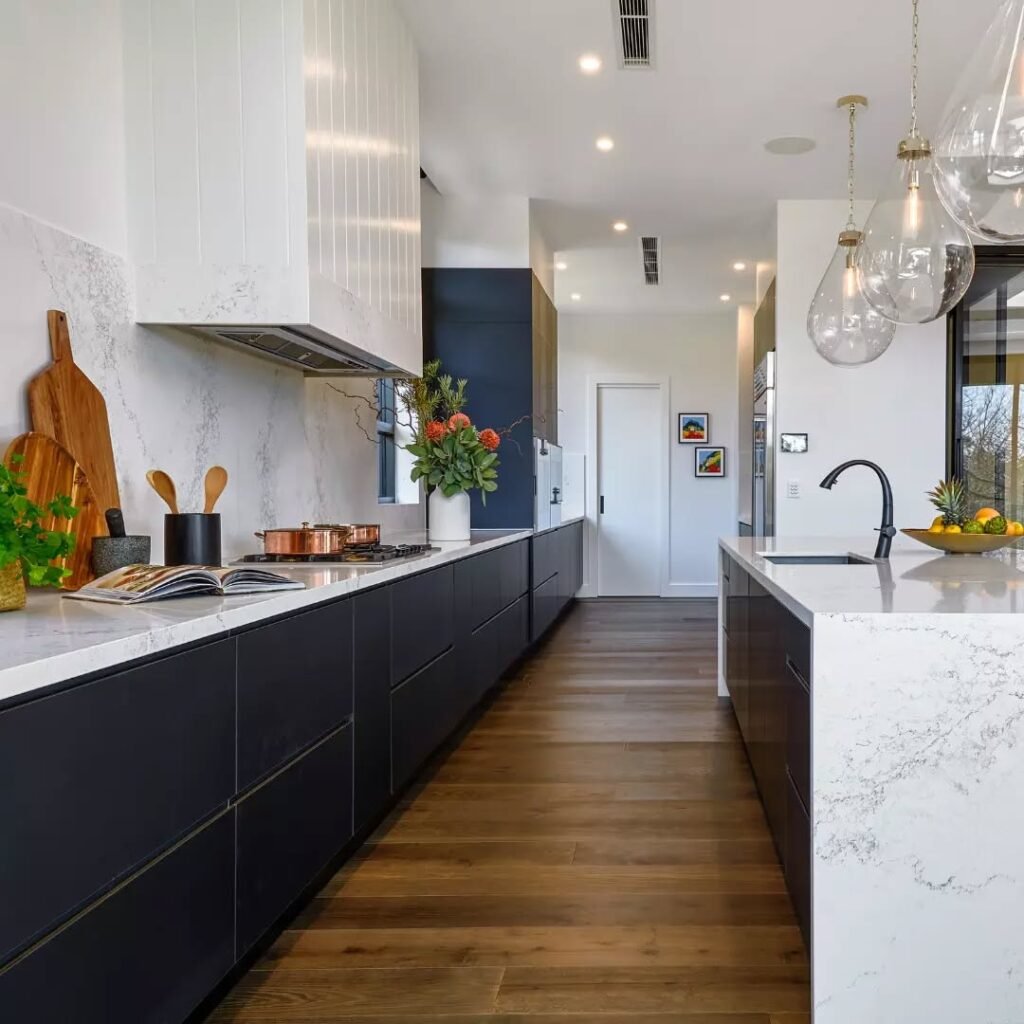 Modern Black and White Galley Kitchen with Luxe Elegance
