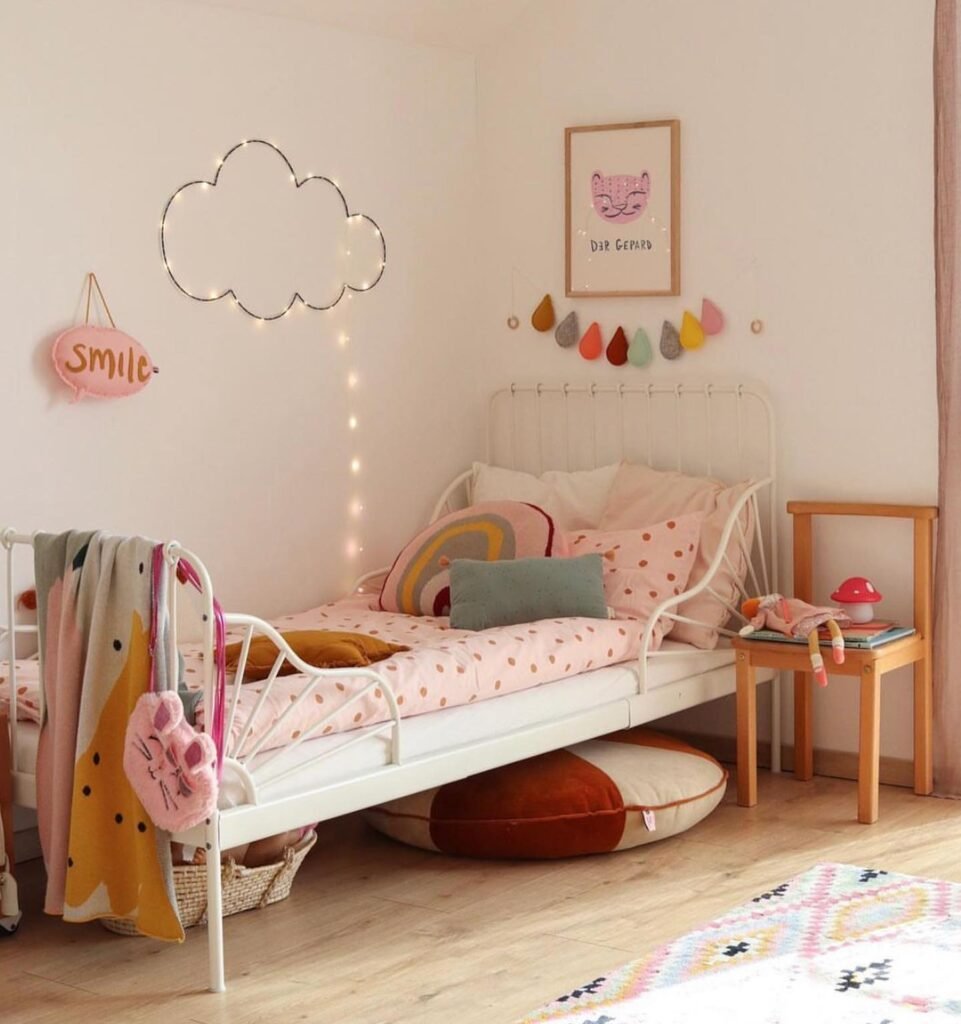 Whimsical and Cozy Pastel-Themed Kids' Bedroom
