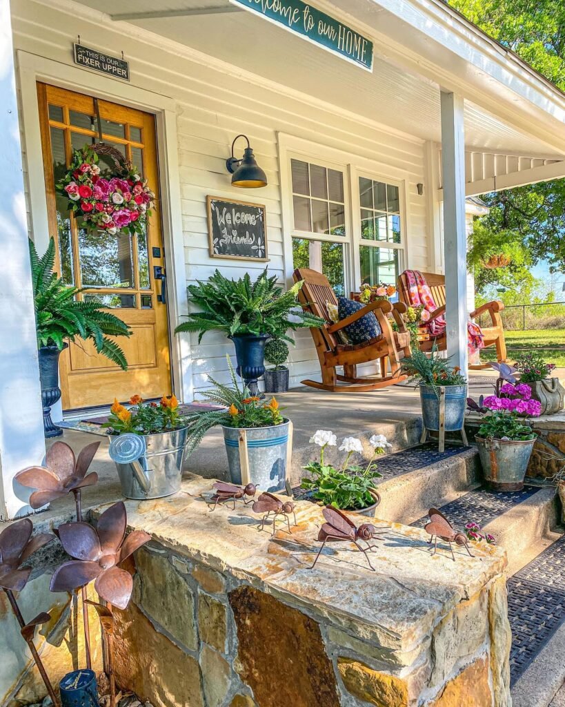 Charming Spring Farmhouse Porch with Rustic Accents
