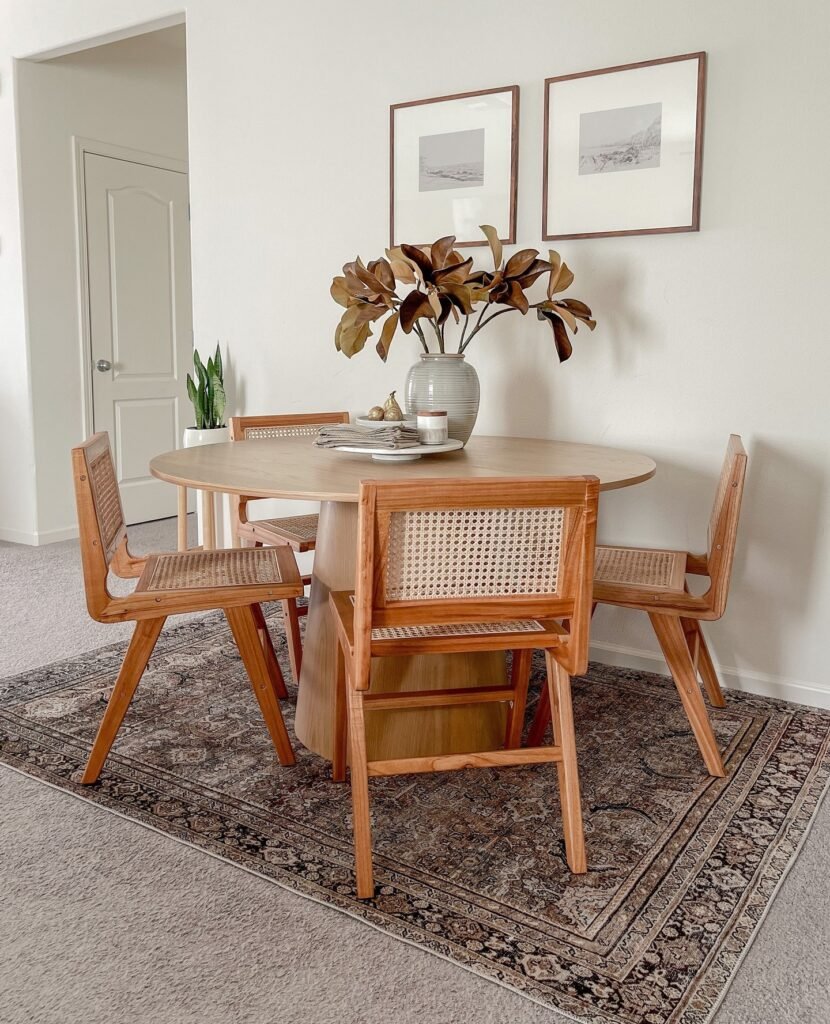 Minimalist Mid-Century Round Dining Table Setup
